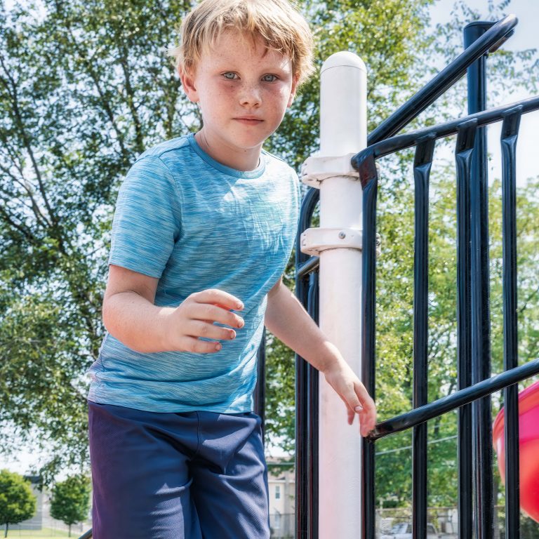 young boy playing