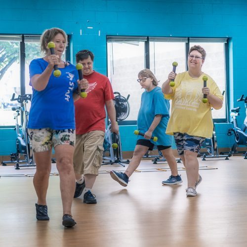 group of adults exercising